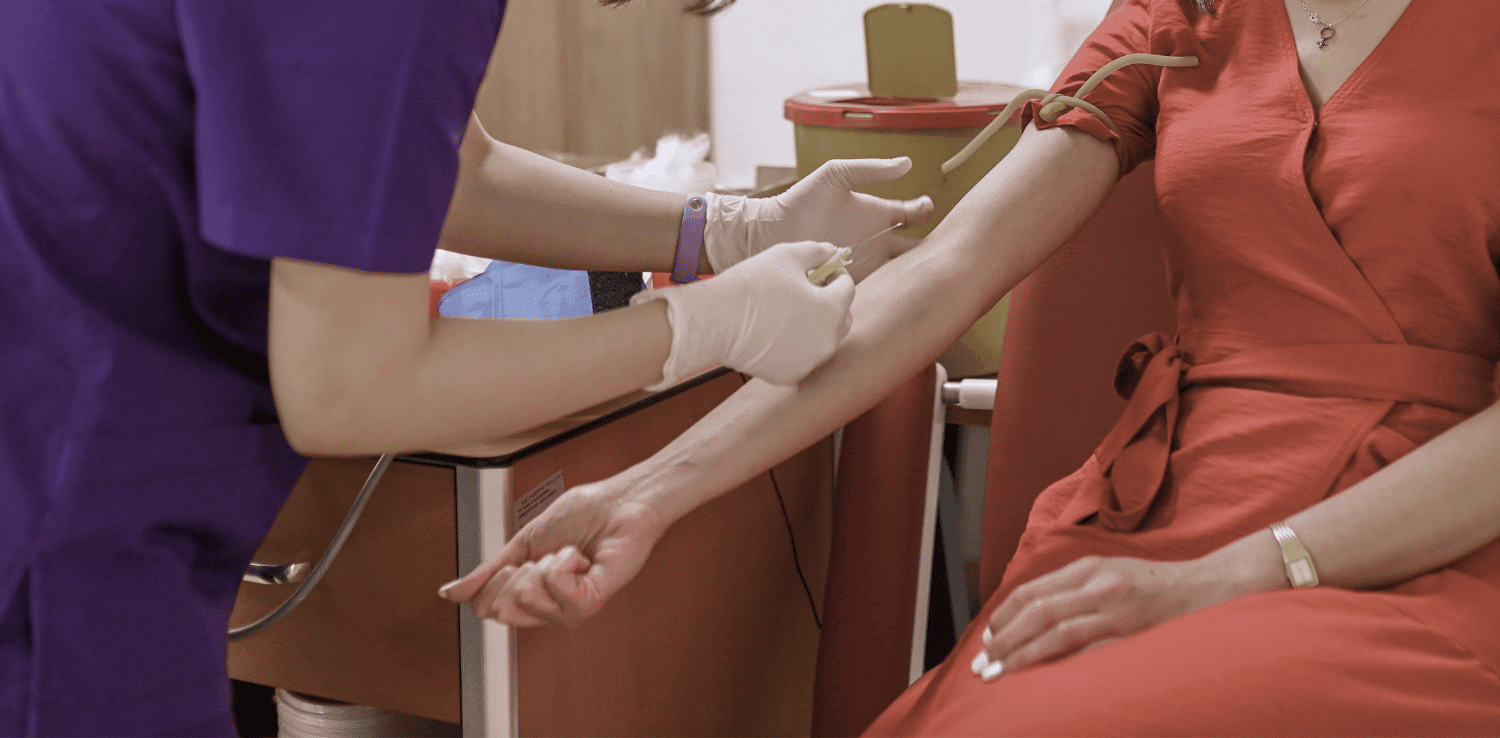 Nurse drawing blood for HIV testing in Indianapolis