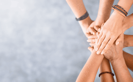 Members of HIV Support groups touching each other
